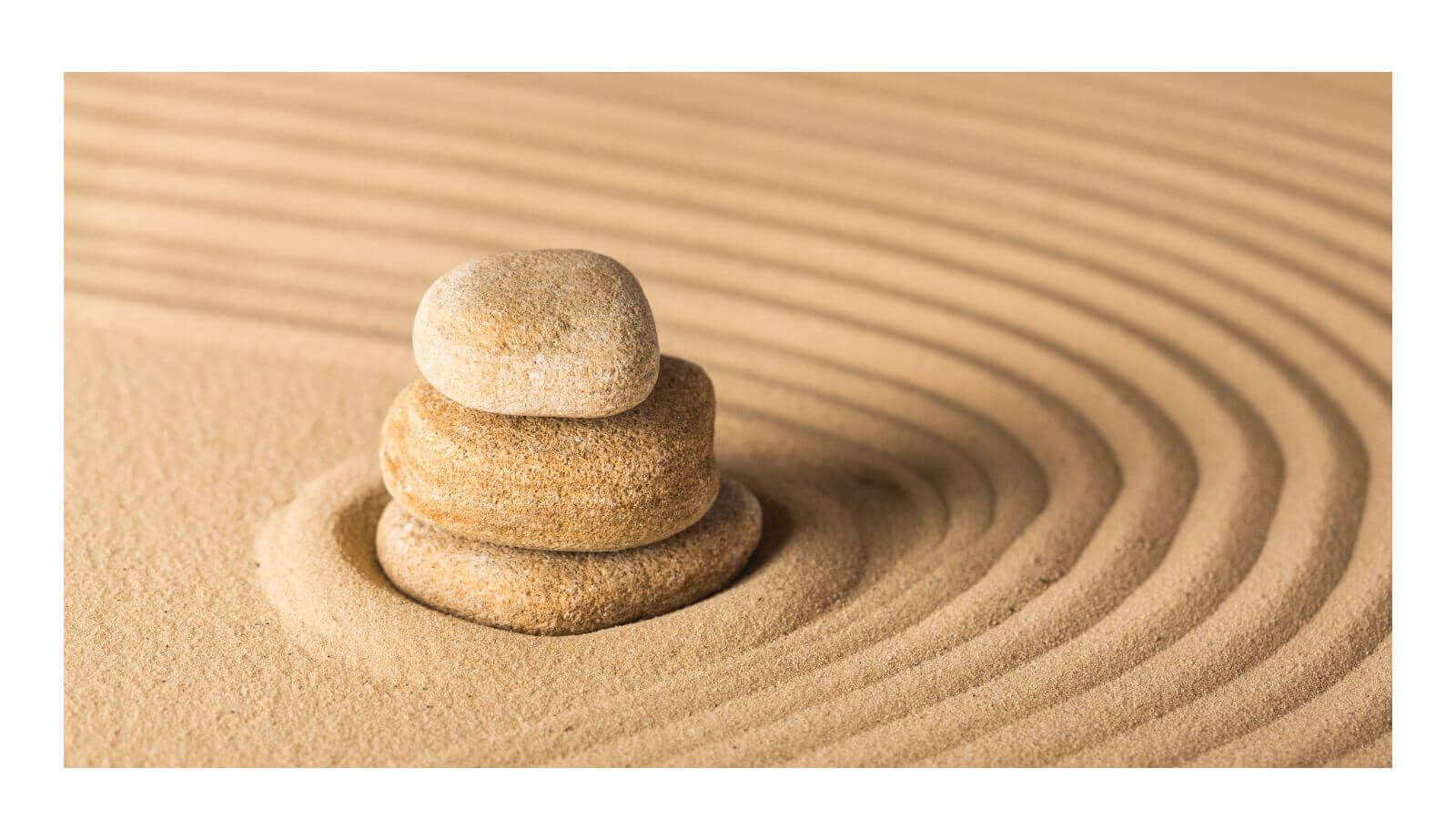 creating a life of peace. stones in sand.